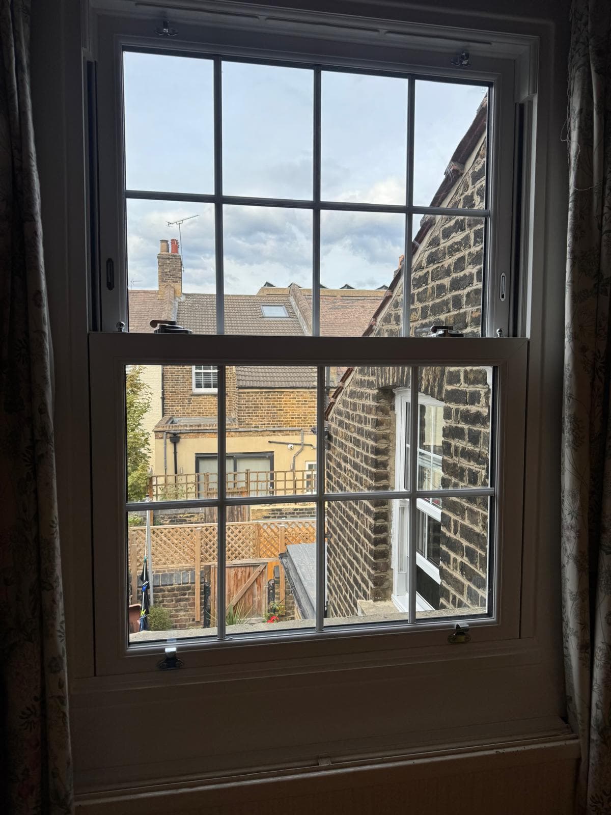 Sliding sash window seen from inside, London terrace