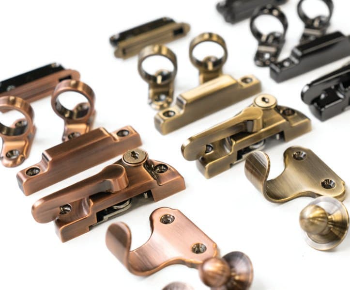 Sash window fasteners, lifts and finger pulls in Antique Gold and brass finishes